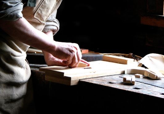 MAN IN WORKSHOP