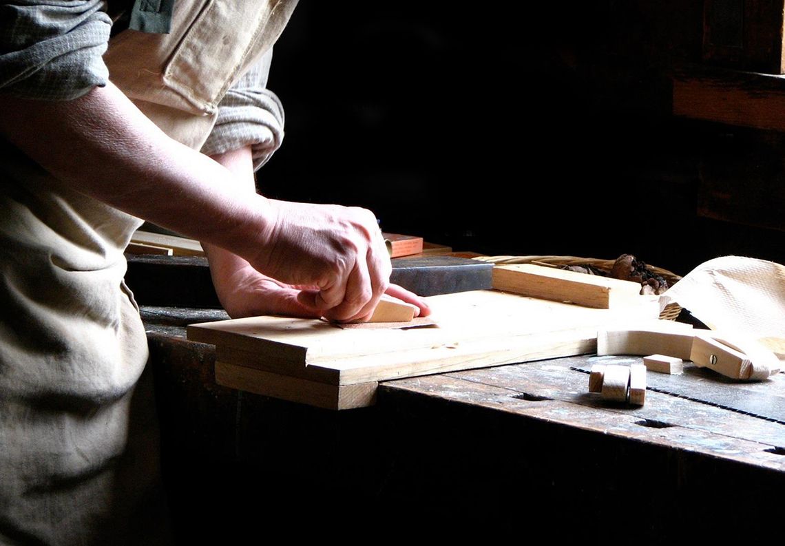 MAN IN WORKSHOP